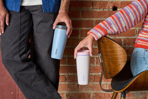 Coffee Mugs Being Held - Blue and Pink - Owala