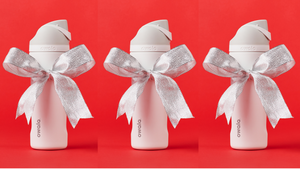 Owala Water Bottles with Christmas bows on them